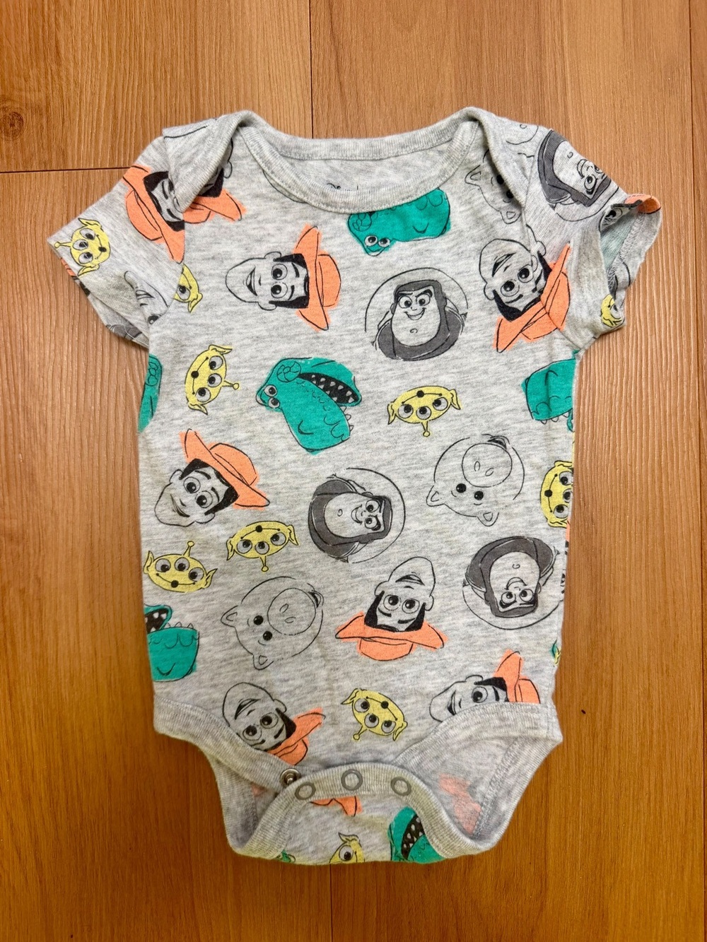 Disney Grey Bodysuit with Orange, Teal & Yellow Character Prints